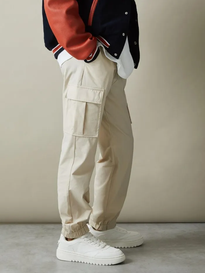 Reiss Trousers Children 39 Yrs Technical Drawstring Cuffed Cargo Trousers In Stone Reiss Trousers Children 39 Yrs Technical Drawstring Cuffed Cargo Trousers In Stone