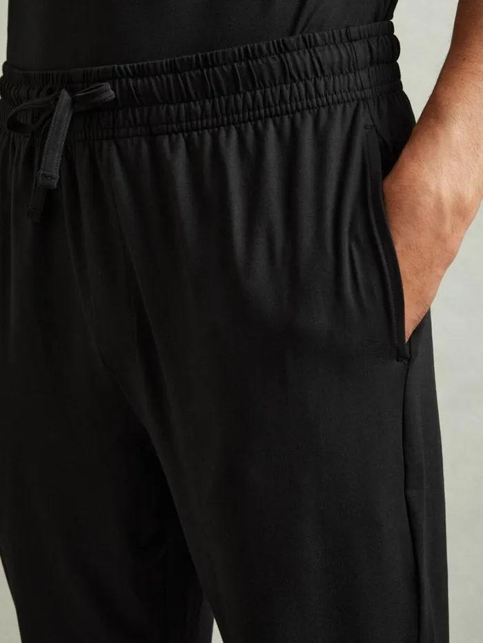 Reiss Trousers Men Tapered StretchJersey Joggers In Black Reiss Trousers Men Tapered StretchJersey Joggers In Black
